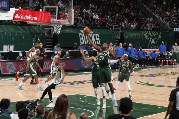 Khris Middleton of the Milwaukee Bucks rebounds the ball against the Brooklyn Nets during Round 2, Game 3 of the 2021 NBA Playoffs on June 10, 2021...