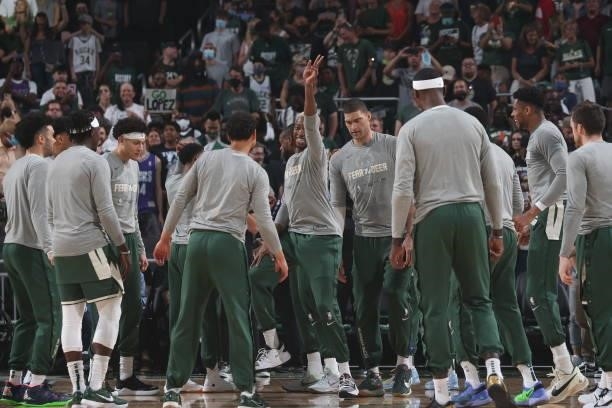The Milwaukee Bucks huddle up prior to a game against the Brooklyn Nets during Round 2, Game 3 of the 2021 NBA Playoffs on June 10, 2021 at the...