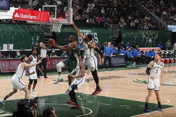 Khris Middleton of the Milwaukee Bucks drives to the basket against the Brooklyn Nets during Round 2, Game 3 of the 2021 NBA Playoffs on June 10,...