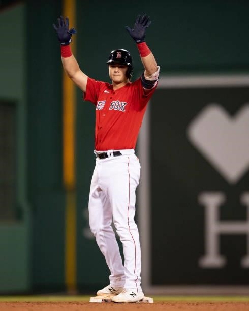 Bobby Dalbec of the Boston Red Sox reacts after hitting an RBI double during the sixth inning of a game against the Houston Astros on June 10, 2021...