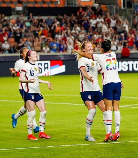 Samantha Mewis celebrates with Christen Press of the United States after scoring a goal against Portugal in the second half of the 2021 WNT Summer...
