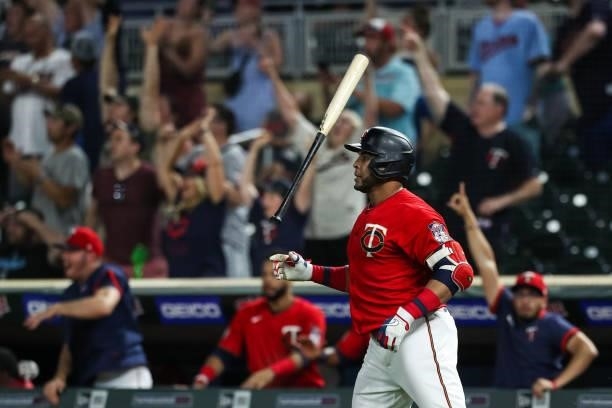 Nelson Cruz of the Minnesota Twins watches his two-run walk off home run against the New York Yankees in the ninth inning of the game at Target Field...