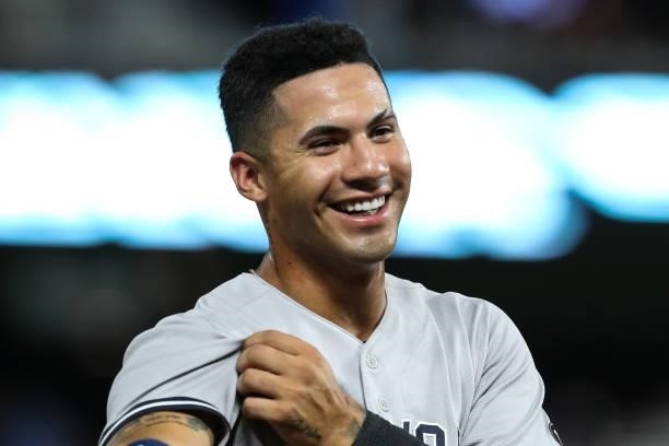 Gleyber Torres of the New York Yankees smiles in the seventh inning of the game against the Minnesota Twins at Target Field on June 10, 2021 in...