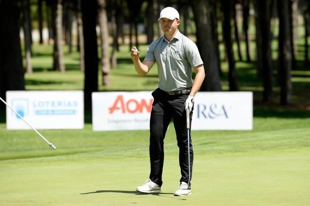 Kristof Ulenaers of Belgium reacts after putts his third shot on the eighteen hole during Day Two of the Challenge de Cadiz at Iberostar Real Club de...