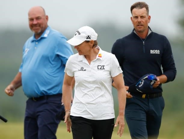 Henrik Stenson of Sweden,Thomas Bjorn of Denmark and Annika Sorenstam of Sweden walk off the 9th hole during the second round of The Scandinavian...