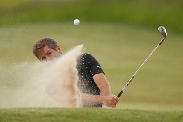 Robert Rock of England hits a bunker shot on the 12th hole during the second round of The Scandinavian Mixed Hosted by Henrik and Annika at Vallda...