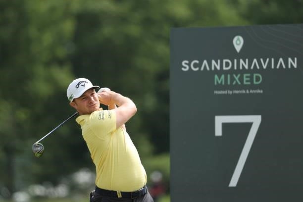 Oliver Fisher of England tees off on the 7th hole during the second round of The Scandinavian Mixed Hosted by Henrik and Annika at Vallda Golf &...