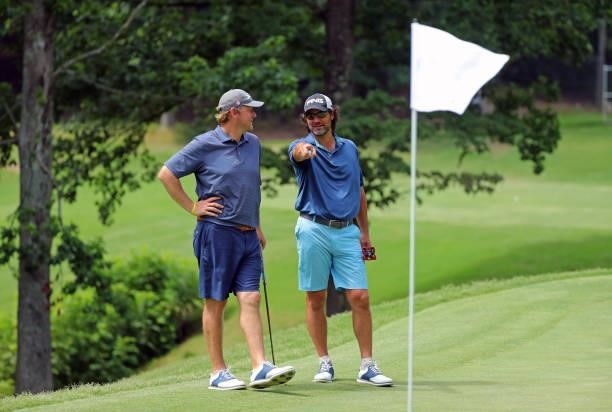 Steven Bright and Dr. Jeff Harris stand on the green on the 12th hole during the second round of the BMW Charity Pro-Am presented by Synnex...