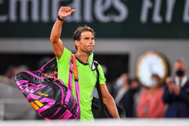 Rafael NADAL of Spain leaves the court dejected during the ninth round of Roland Garros at Roland Garros on June 11, 2021 in Paris, France.