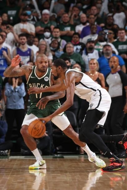 Tucker of the Milwaukee Bucks plays defense on Kevin Durant of the Brooklyn Nets during Round 2, Game 3 of the 2021 NBA Playoffs on June 10, 2021 at...