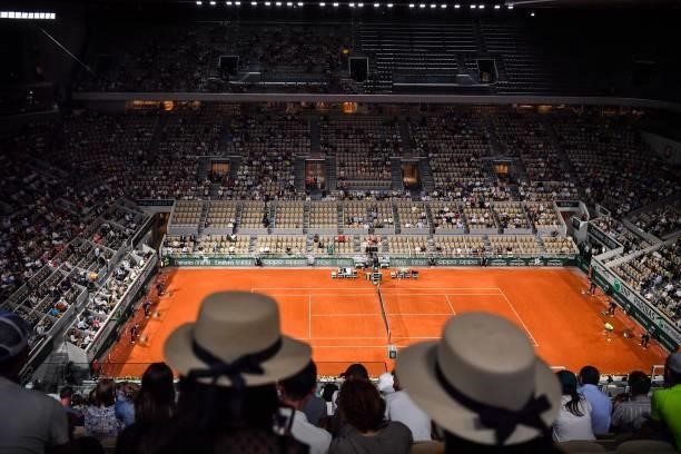 Fans watch the game during the ninth round of Roland Garros at Roland Garros on June 11, 2021 in Paris, France.