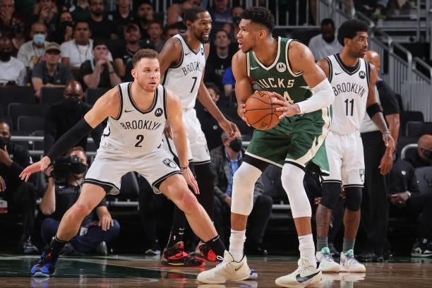 Blake Griffin of the Brooklyn Nets plays defense on Giannis Antetokounmpo of the Milwaukee Bucks during Round 2, Game 3 of the 2021 NBA Playoffs on...