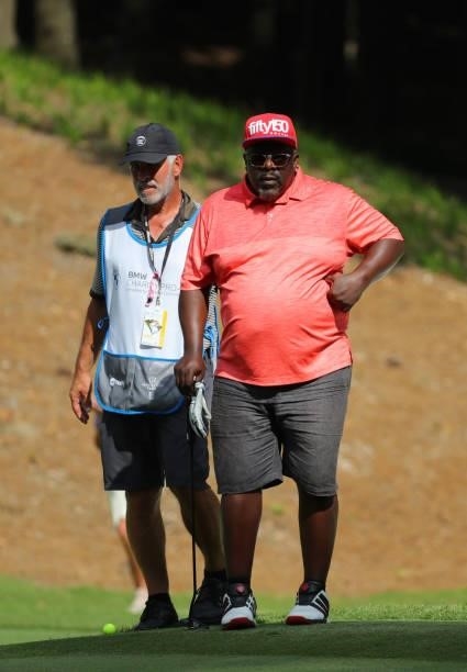 Cedric the Entertainer waits to putt on the fourth hole during the second round of the BMW Charity Pro-Am presented by Synnex Corporation at the...