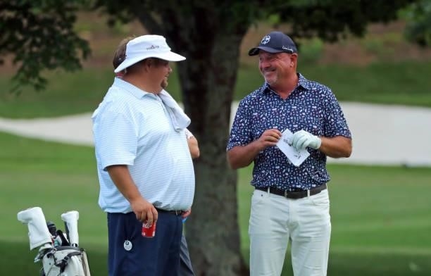 Nathan Merritt and Richard Kay share a laugh between shots on the fifth hole during the second round of the BMW Charity Pro-Am presented by Synnex...