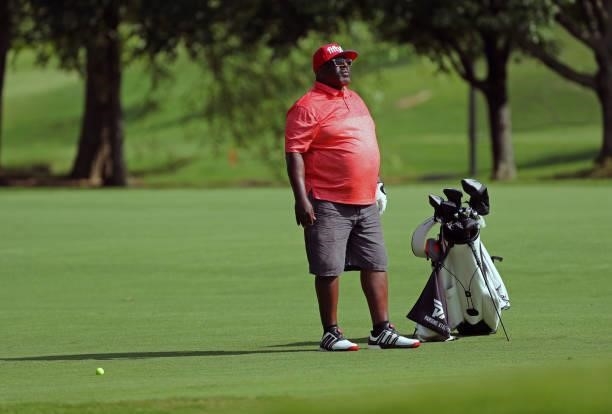 Cedric the Entertainer waits to play a shot on the fifth hole during the second round of the BMW Charity Pro-Am presented by Synnex Corporation at...