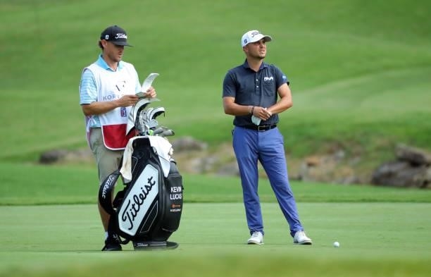 Kevin Lucas and his caddie get ready to play a shot on the fifth hole during the second round of the BMW Charity Pro-Am presented by Synnex...