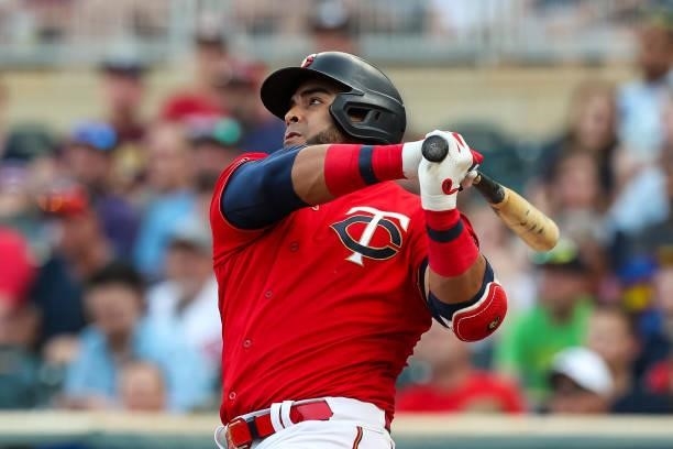 Nelson Cruz of the Minnesota Twins hits a solo home run against the Houston Astros in the first inning of the game at Target Field on June 11, 2021...
