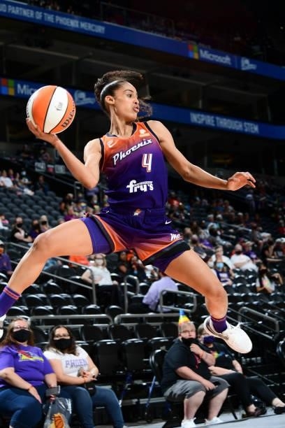 Skylar Diggins-Smith of the Phoenix Mercury looks to pass the ball during the game against the Dallas Wings on June 11, 2021 at Phoenix Suns Arena in...