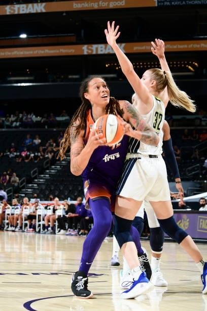 Brittney Griner of the Phoenix Mercury drives to the basket during the game against the Dallas Wings on June 11, 2021 at Phoenix Suns Arena in...
