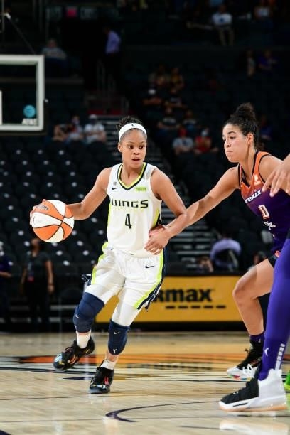 Moriah Jefferson of the Dallas Wings handles the ball during the game against the Phoenix Mercury on June 11, 2021 at Phoenix Suns Arena in Phoenix,...