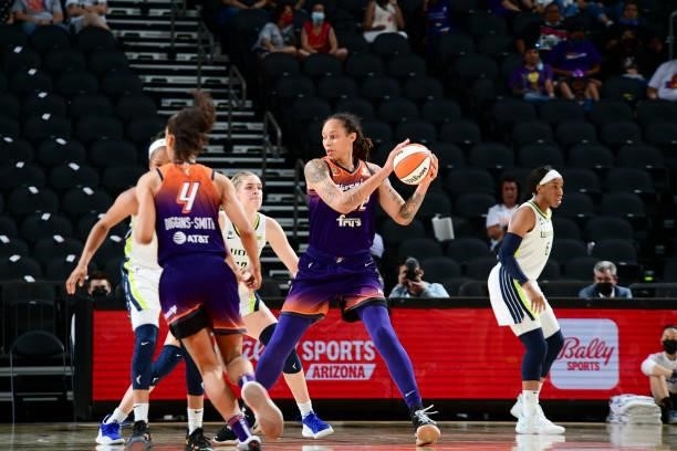 Brittney Griner of the Phoenix Mercury handles the ball during the game against the Dallas Wings on June 11, 2021 at Phoenix Suns Arena in Phoenix,...