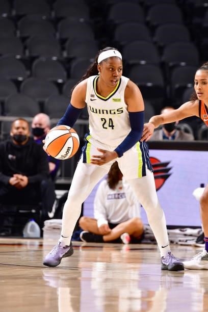 Arike Ogunbowale of the Dallas Wings handles the ball against the Phoenix Mercury on June 11, 2021 at Phoenix Suns Arena in Phoenix, Arizona. NOTE TO...