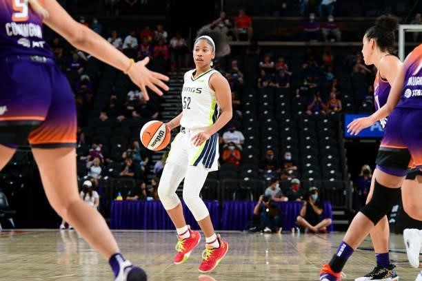 Tyasha Harris of the Dallas Wings handles the ball during the game against the Phoenix Mercury on June 11, 2021 at Phoenix Suns Arena in Phoenix,...