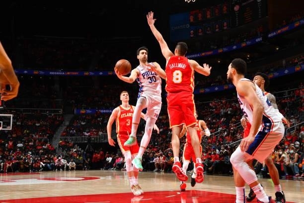 Furkan Korkmaz of the Philadelphia 76ers passes the ball against the Atlanta Hawks during Round 2, Game 3 of the Eastern Conference Playoffs on June...