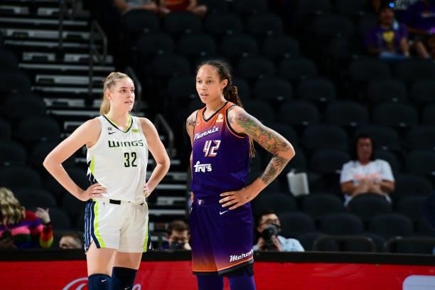 Bella Alarie of the Dallas Wings talks to Brittney Griner of the Phoenix Mercury during the game on June 11, 2021 at Phoenix Suns Arena in Phoenix,...