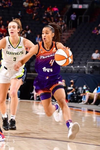 Skylar Diggins-Smith of the Phoenix Mercury handles the ball against the Dallas Wings on June 11, 2021 at Phoenix Suns Arena in Phoenix, Arizona....