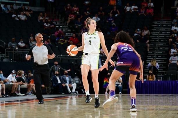 Marina Mabrey of the Dallas Wings handles the ball during the game against the Phoenix Mercury on June 11, 2021 at Phoenix Suns Arena in Phoenix,...