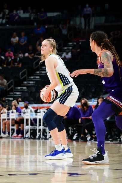 Bella Alarie of the Dallas Wings handles the ball during the game against the Phoenix Mercury on June 11, 2021 at Phoenix Suns Arena in Phoenix,...
