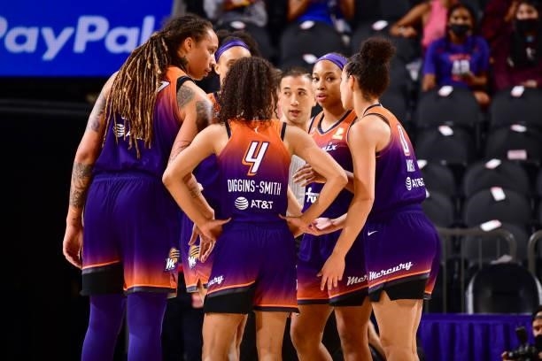 The Phoenix Mercury huddle up during the game against the Dallas Wings on June 11, 2021 at Phoenix Suns Arena in Phoenix, Arizona. NOTE TO USER: User...