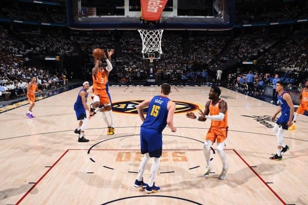 Chris Paul of the Phoenix Suns drives to the basket against the Denver Nuggets during Round 2, Game 3 of the 2021 NBA Playoffs on June 11, 2021 at...