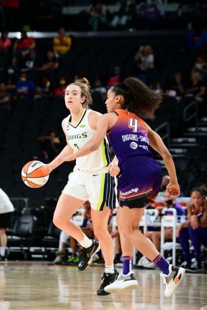 Marina Mabrey of the Dallas Wings handles the ball during the game against the Phoenix Mercury on June 11, 2021 at Phoenix Suns Arena in Phoenix,...