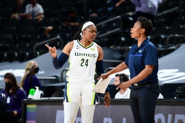 Arike Ogunbowale of the Dallas Wings talks to Head Coach Vickie Johnson of the Dallas Wings during the game against the Phoenix Mercury on June 11,...