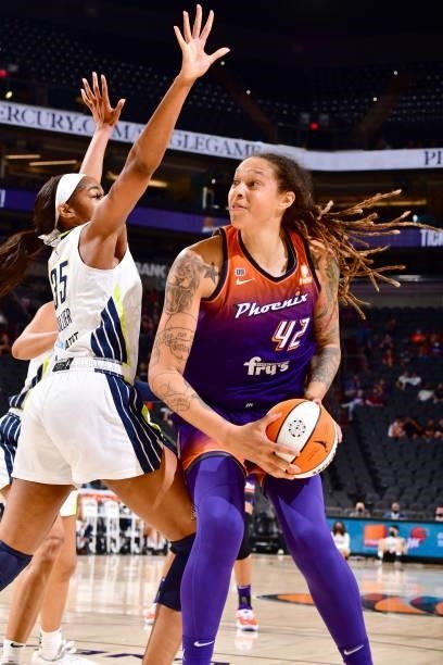 Brittney Griner of the Phoenix Mercury handles the ball against the Dallas Wings on June 11, 2021 at Phoenix Suns Arena in Phoenix, Arizona. NOTE TO...