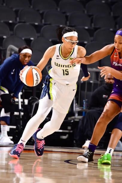 Allisha Gray of the Dallas Wings handles the ball against the Phoenix Mercury on June 11, 2021 at Phoenix Suns Arena in Phoenix, Arizona. NOTE TO...