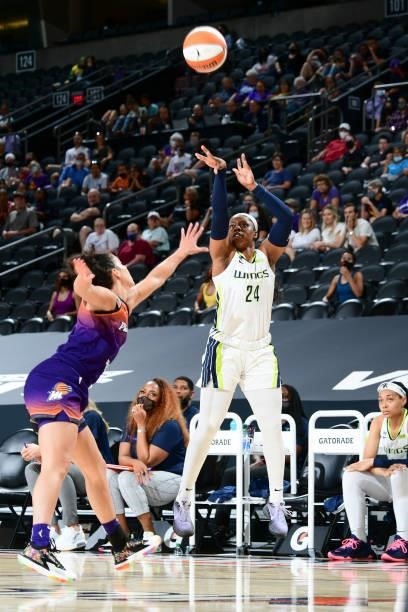 Arike Ogunbowale of the Dallas Wings shoots the ball during the game ;apm on June 11, 2021 at Phoenix Suns Arena in Phoenix, Arizona. NOTE TO USER:...