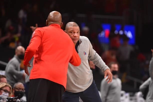 Head Coach Nate McMillan of the Atlanta Hawks and Head Coach Doc Rivers of the Philadelphia 76ers hug after a game during Round 2, Game 3 of the...