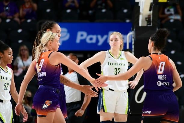 Sophie Cunningham of the Phoenix Mercury high fives Kia Nurse of the Phoenix Mercury during the game against the Dallas Wings on June 11, 2021 at...
