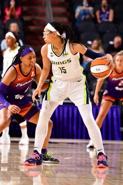 Allisha Gray of the Dallas Wings handles the ball against the Phoenix Mercury on June 11, 2021 at Phoenix Suns Arena in Phoenix, Arizona. NOTE TO...
