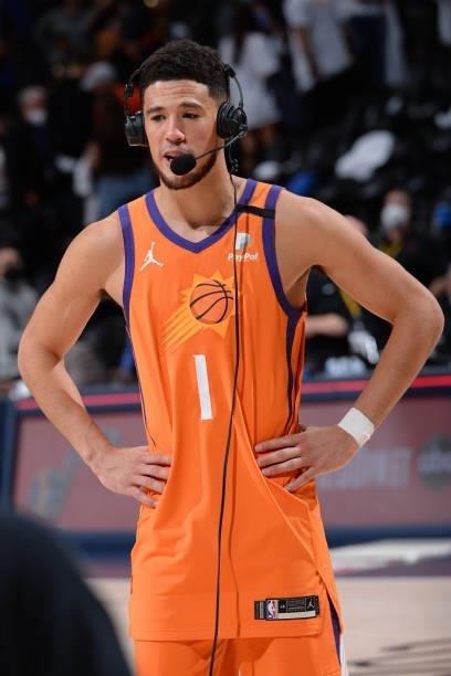 Devin Booker of the Phoenix Suns is interviewed after the game against the Denver Nuggets during Round 2, Game 3 of the 2021 NBA Playoffs on June 11,...