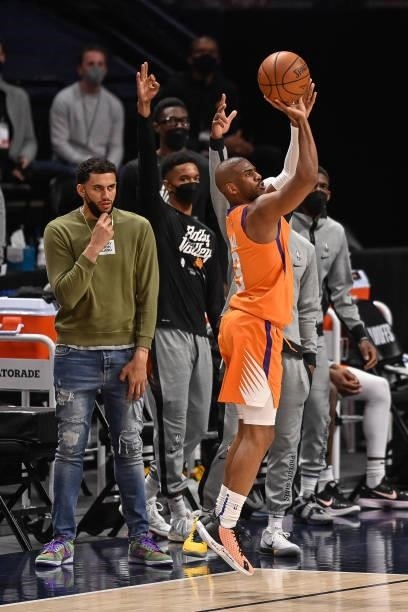 Chris Paul of the Phoenix Suns shoots a fourth quarter shot in Game Three of the Western Conference second-round playoff series at Ball Arena on June...