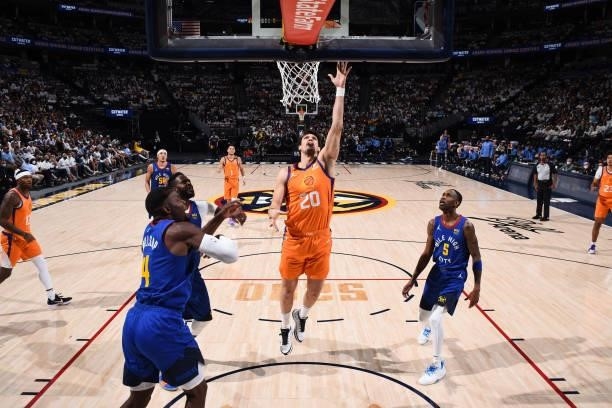 Dario Saric of the Phoenix Suns drives to the basket against the Denver Nuggets during Round 2, Game 3 of the 2021 NBA Playoffs on June 11, 2021 at...