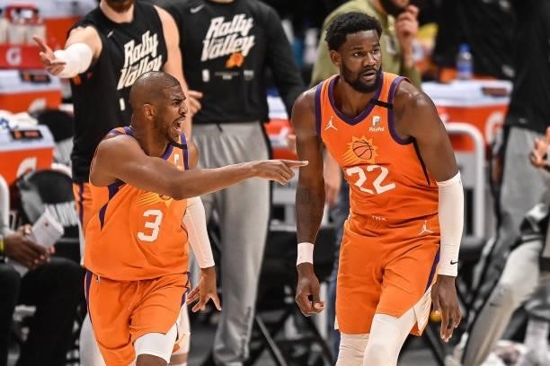 Chris Paul of the Phoenix Suns celebrates after a basket in Game Three of the Western Conference second-round playoff series at Ball Arena on June...