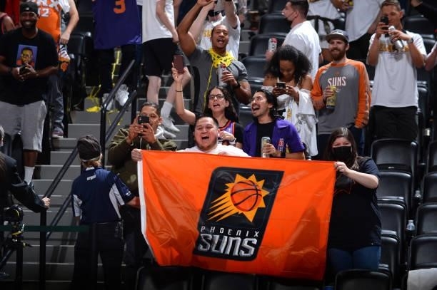 Phoenix Suns fans cheer after the game against the Denver Nuggets during Round 2, Game 3 of the 2021 NBA Playoffs on June 11, 2021 at the Ball Arena...
