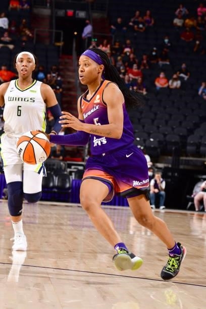 Shey Peddy of the Phoenix Mercury handles the ball against the Dallas Wings on June 11, 2021 at Phoenix Suns Arena in Phoenix, Arizona. NOTE TO USER:...