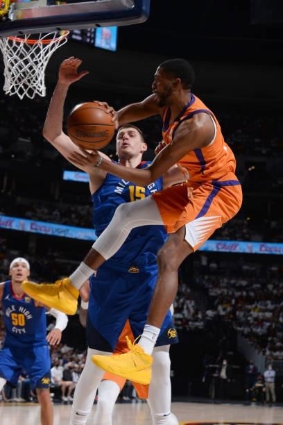 Mikal Bridges of the Phoenix Suns passes the ball during the game against the Denver Nuggets during Round 2, Game 3 of the 2021 NBA Playoffs on June...