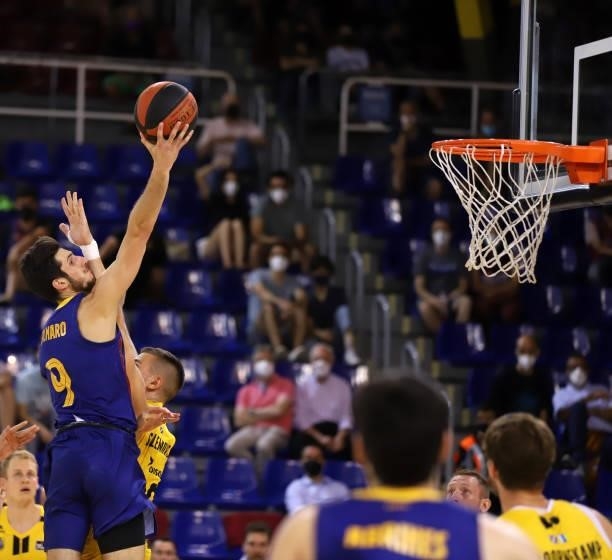 Leandro Bolmaro of FC Barcelona and Emir Sulejmanovic of Lenovo Tenerife battle for the ball during the Liga ACB match between FC Barcelona and...